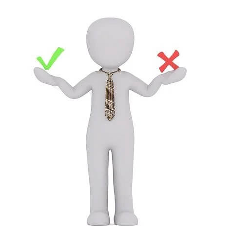 An illustration of a person standing with tick in one hand and a cross in other hand