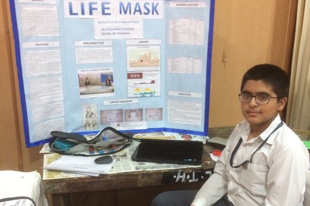 Shivam mukherjee presenting his sanitization band